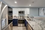 All stainless appliances and custom kitchen cabinets